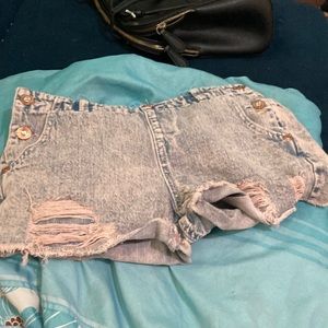 It’s slightly stained pink on purpose came like that has little diamonds